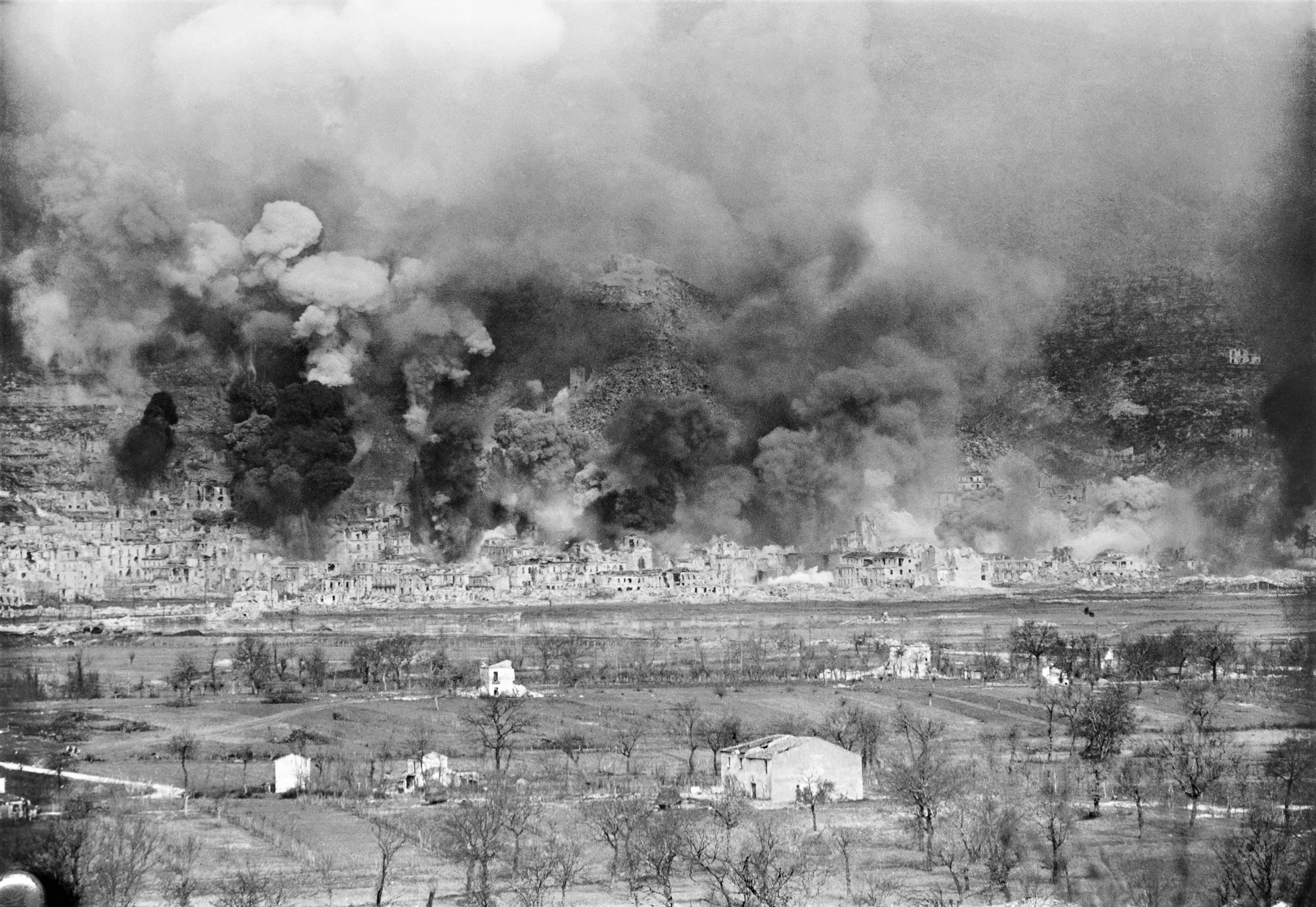 The town of Cassino shrouded in black smoke during the Allied barrage on 15 March 1944