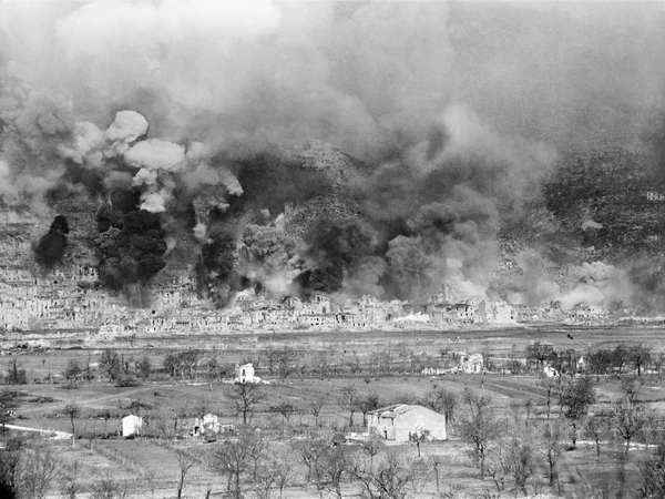 The town of Cassino shrouded in black smoke during the Allied barrage on 15 March 1944