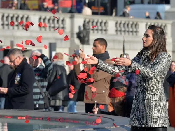 People gathered around Trafalgar Square fountain for Silence in the Square People gathered around the fountain in Trafalgar Square for Silence in the Square