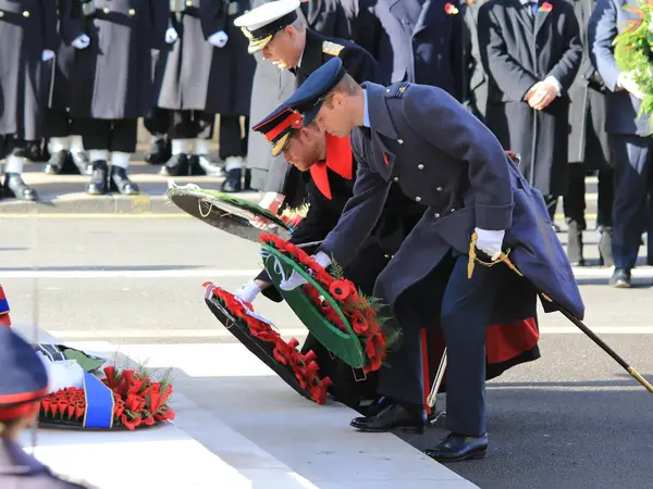 Princes William and Harry laying wreaths at the Cenotaph on Remembrance Sunday