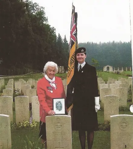 Rose (Florence Jackson-Cooper) and Julia Poulter (RBL Standard Bearer) at Durnbach War Cemetery ""