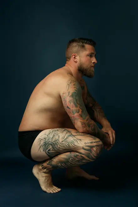 Craig Daniell crouched Craig Daniell crouched