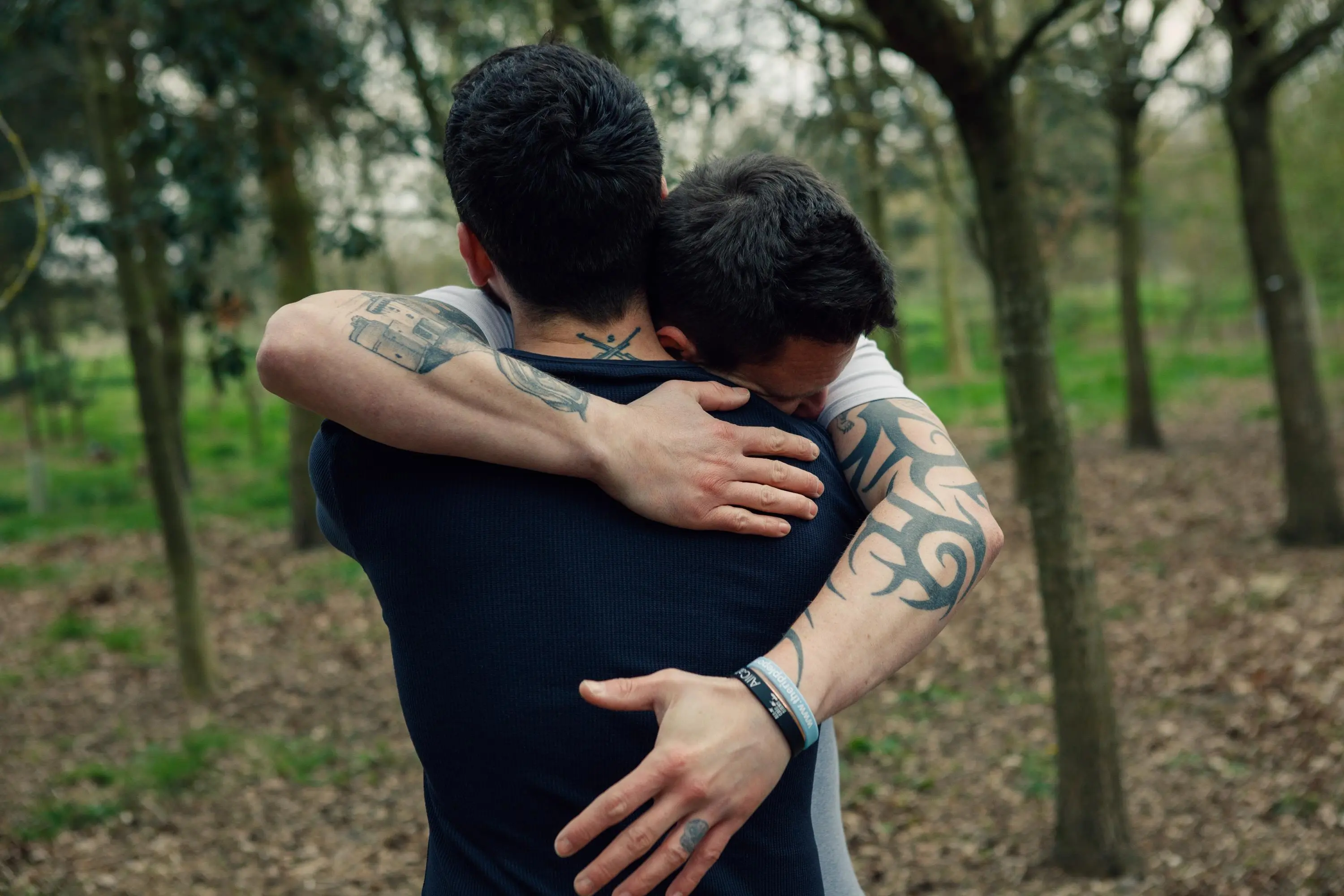Dan Arnold and Stephen James hugging