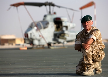 Matt in Afghanistan with helicopter