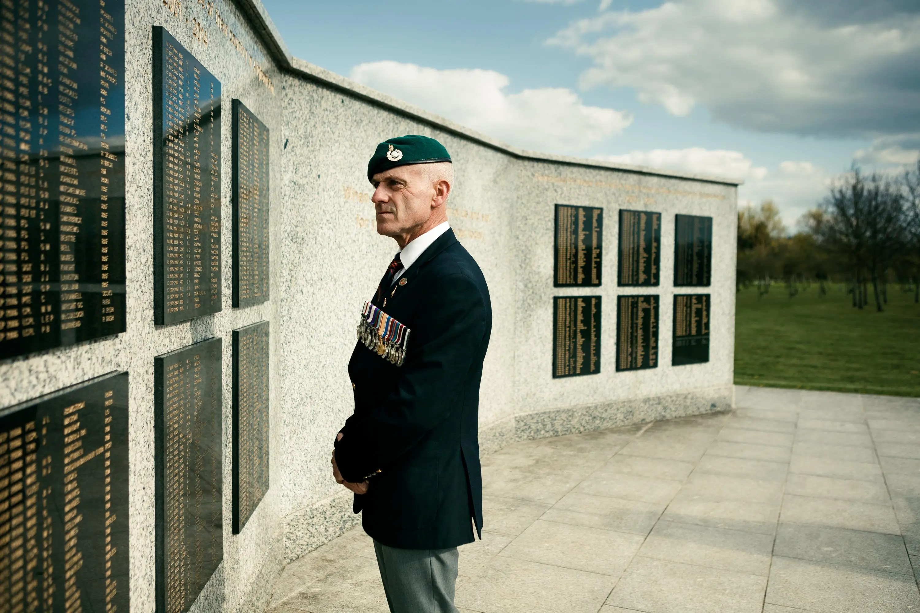Matt Tomlinson looking at memorial