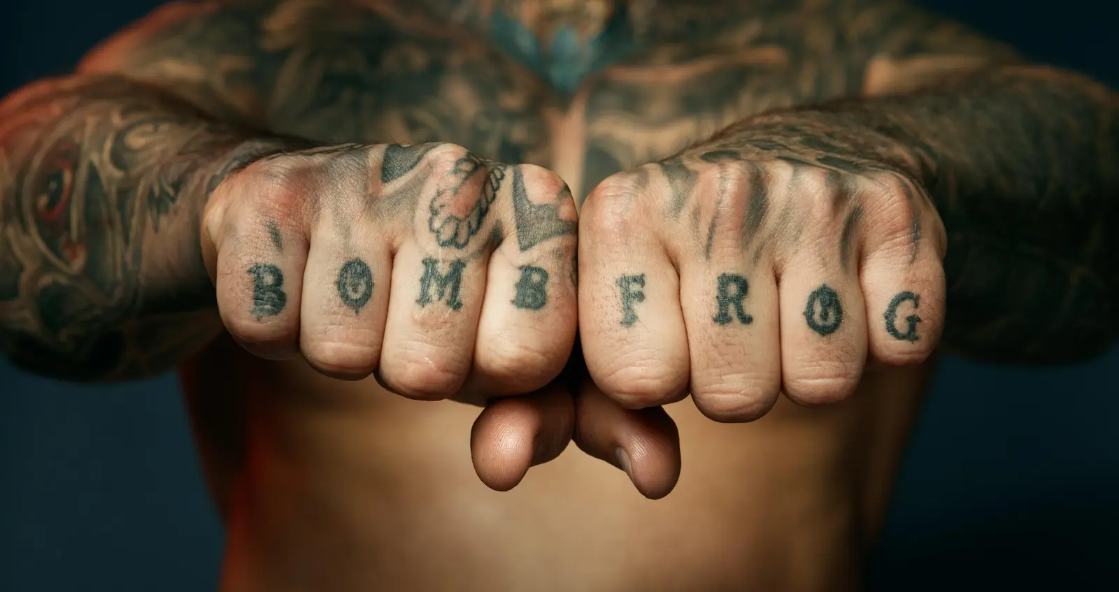 Michael Bell knuckle tattoos
