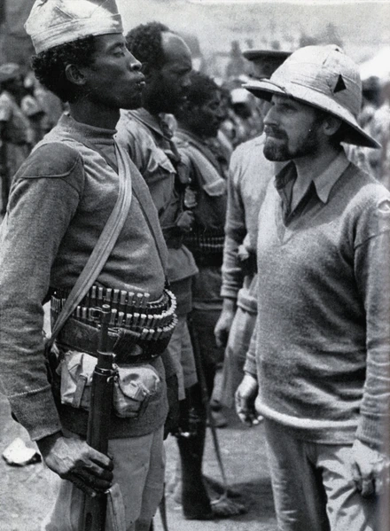 Major-General Orde Wingate, DSO, Commander of the British special forces Chindits in Burma, inspects an African Soldier