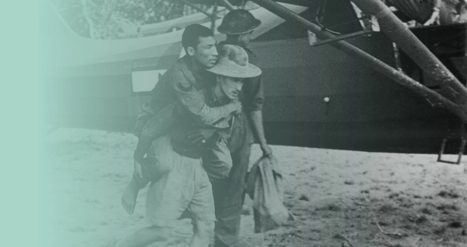 Wounded Chindit carried to aircraft