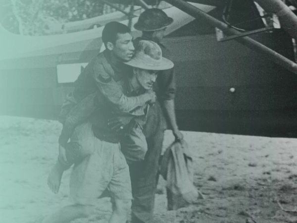 Wounded Chindit carried to aircraft