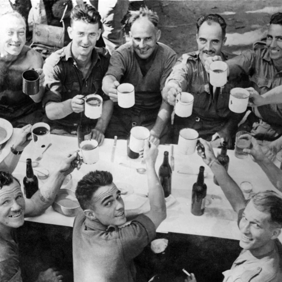 SEAC troops having a drink at a camp bar