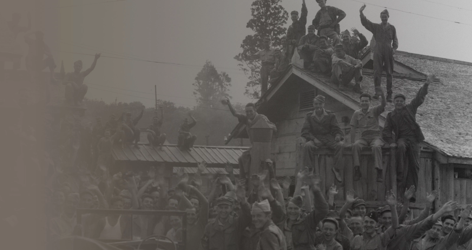 Allied POWs including British & American from Hanawa Camp, Honshu cheer their liberation, 14th September 1945