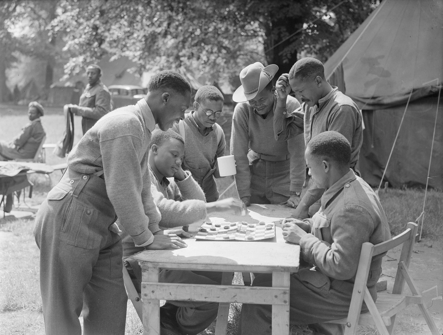 African soldiers play a game of draughts in London