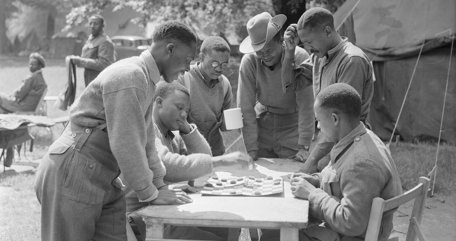 African soldiers play a game of draughts in London