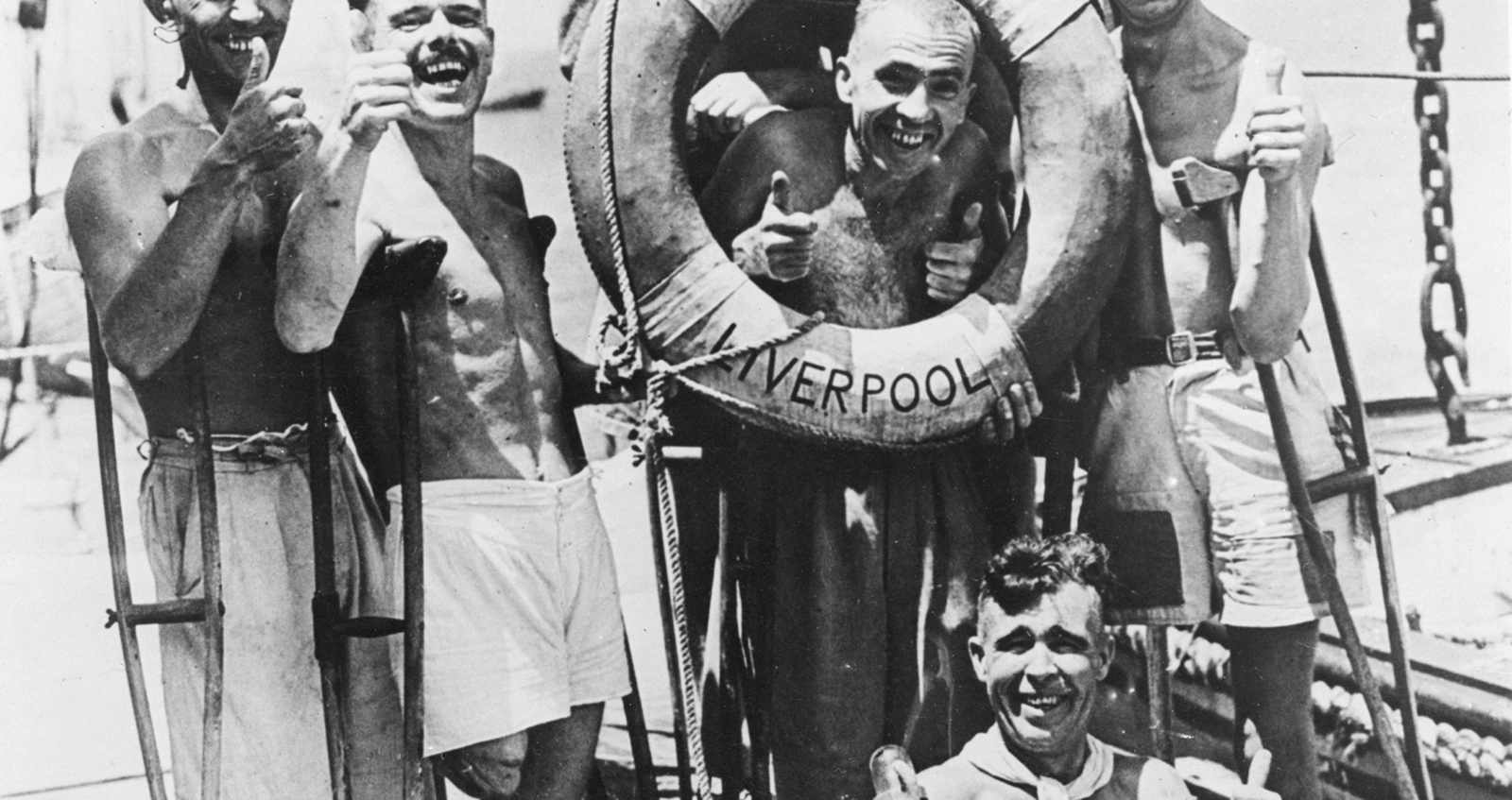 IWM A 030531 Limbless prisoners of war from Hong Kong celebrate