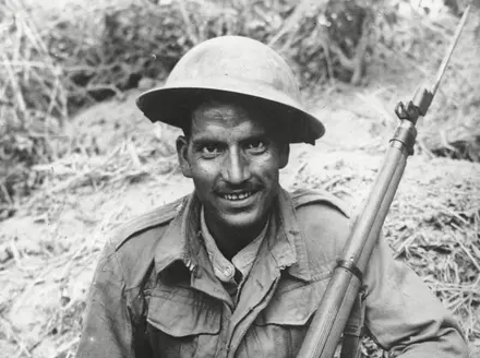 shutterstock_editorial_7418850a A sharp shooter of the Indian Army, fighting in alliance with the British, poses with his rifle, at an unknown location in Burma, in March 1944