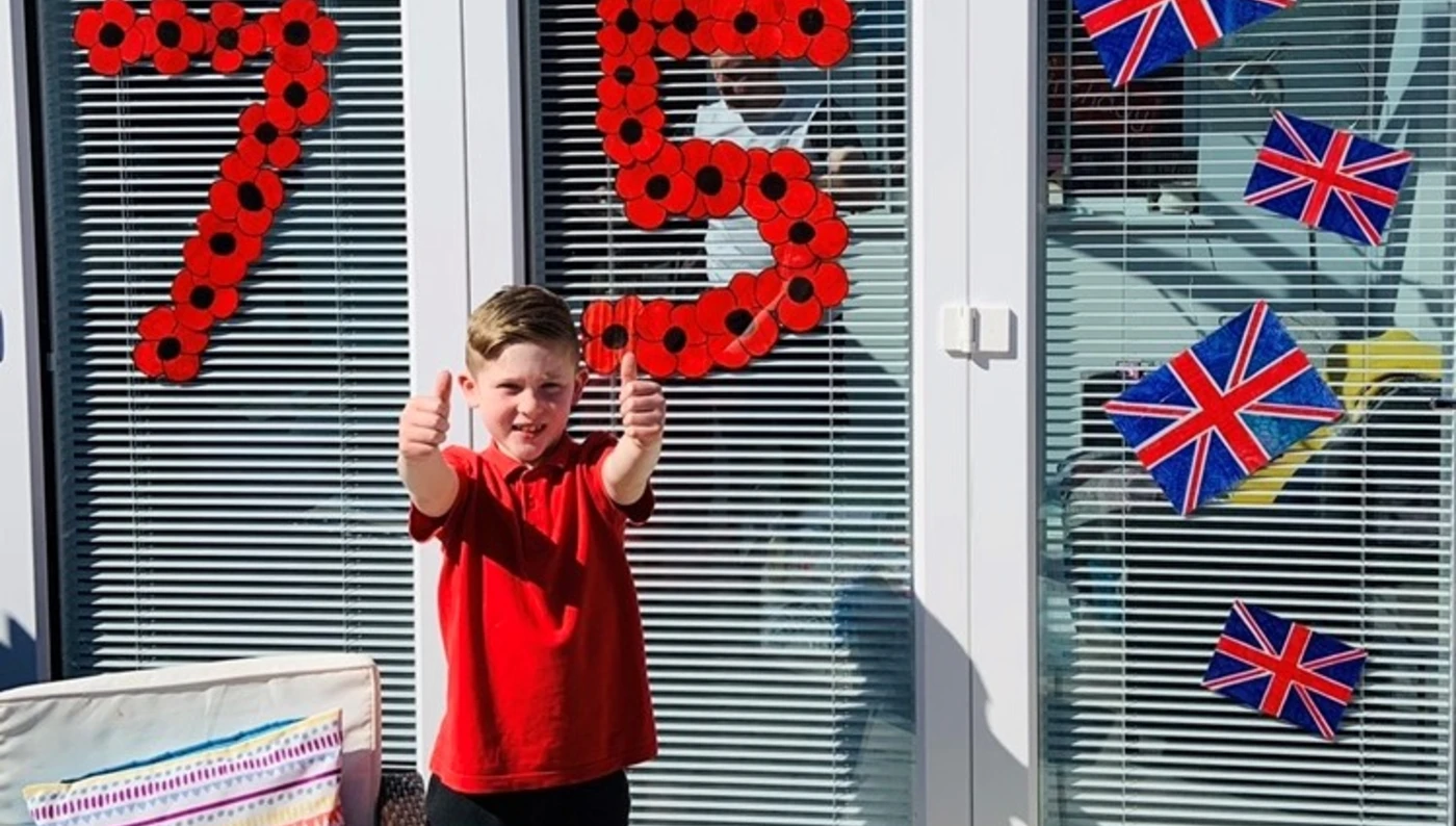 Harry with his VE Day poppy display