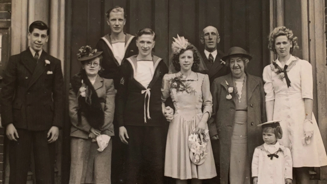 Alec Penstone and Gladys on their wedding with guests.