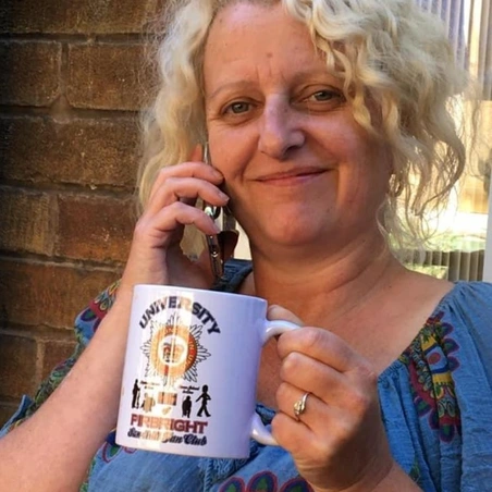 Ann holding mug Ann holding mug