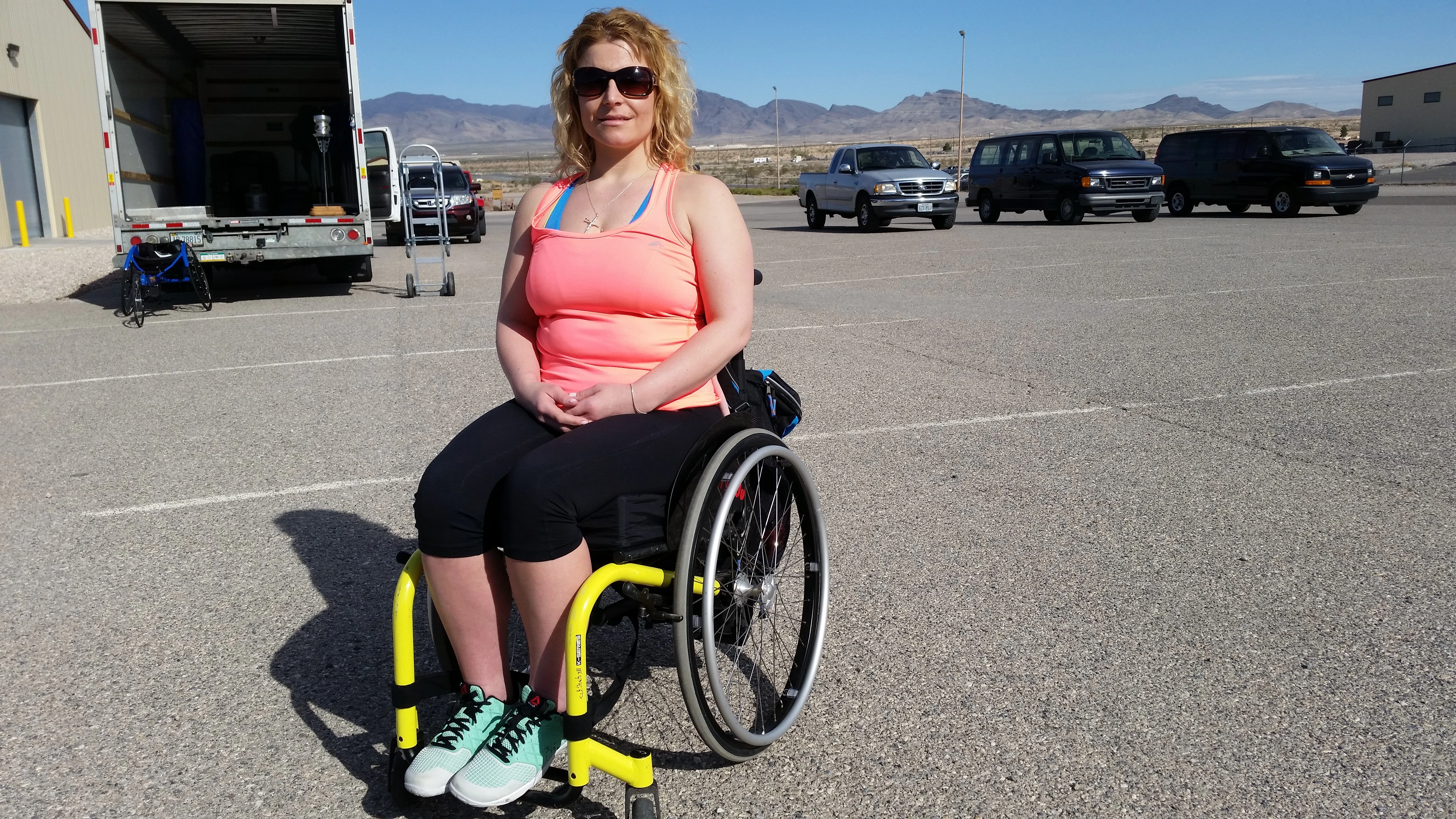 Anna Pollock in wheelchair outdoors