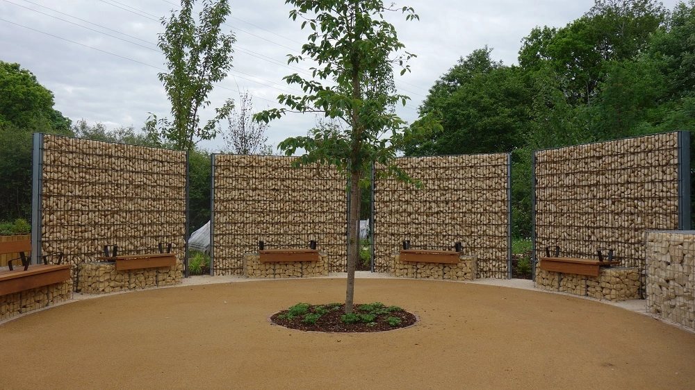 Seated areas provide space for reflection in Armed Forces Community Garden