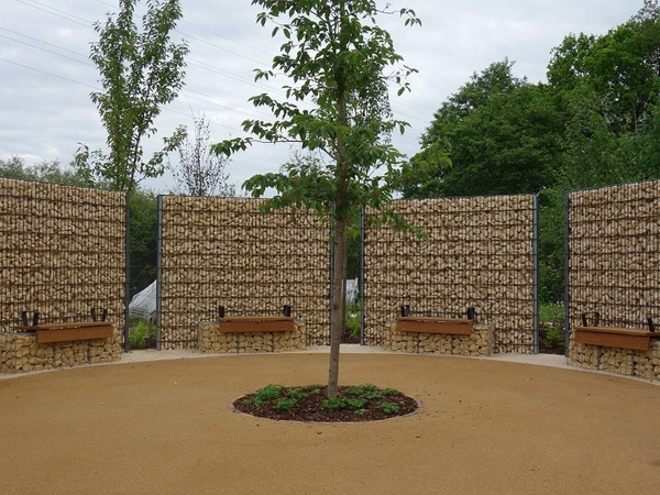 Seated areas provide space for reflection in Armed Forces Community Garden