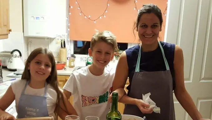 Ted Youd's wife and children in kitchen