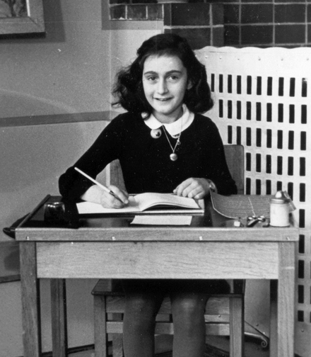  Anne Frank sat a writing desk in 1940.