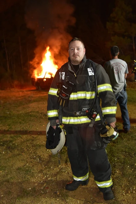 Chris volunteering as a firefighter in the US Chris volunteering as a firefighter in the US