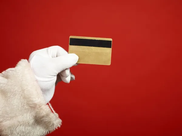 Santa holding a credit card