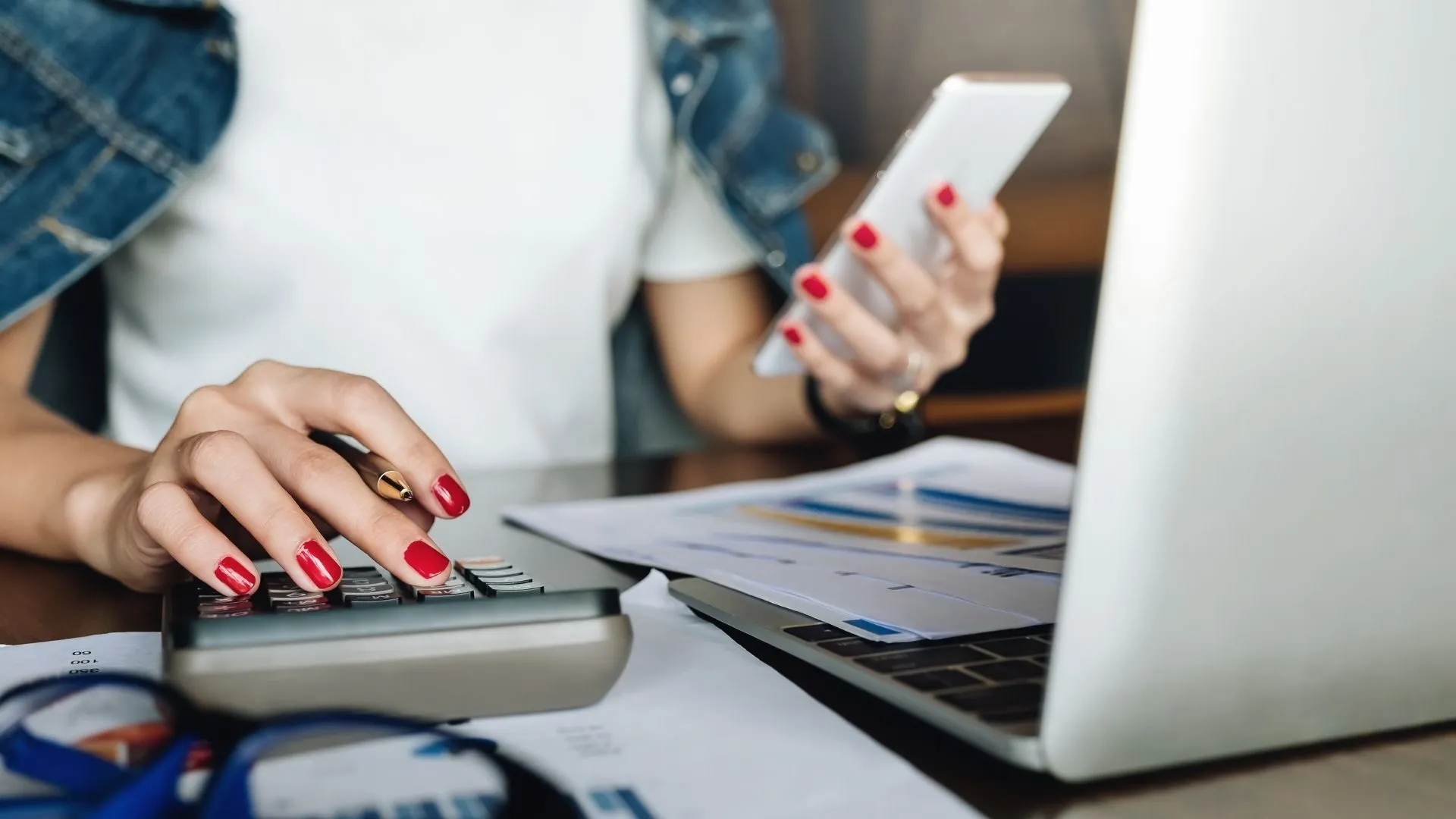 A person checking their financies on a laptop