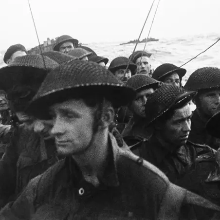 Film still from the D-Day landings showing commandos aboard a landing craft on their approach to Sword Beach, 6 June 1944. 