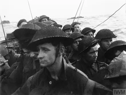 Film still from the D-Day landings showing commandos aboard a landing craft on their approach to Sword Beach, 6 June 1944. 