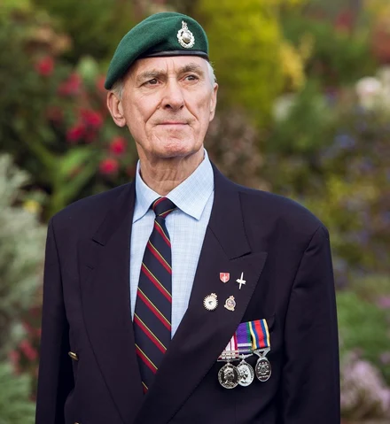 stories_denissparrow_remembrance_image Denis Sparrow wearing badges and medals for Remembrance