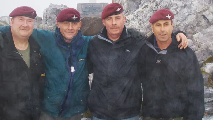 Trevor on top of Mount Longdon in 2014 with fellow veterans