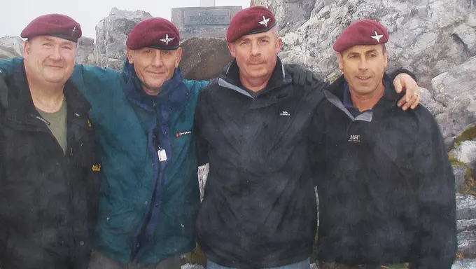 stories_trevor_bradshaw_group _shot Trevor on top of Mount Longdon in 2014 with fellow veterans
