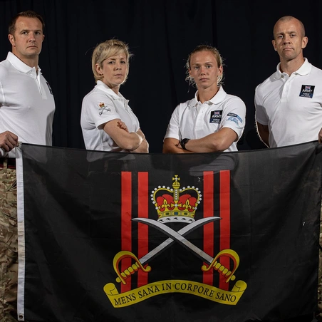 Force Atlantic team holding Army flag