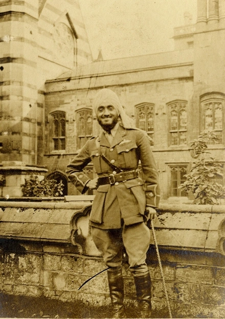 Hardit Singh Malik in the gardens at Balliol, looking toward the Old Library