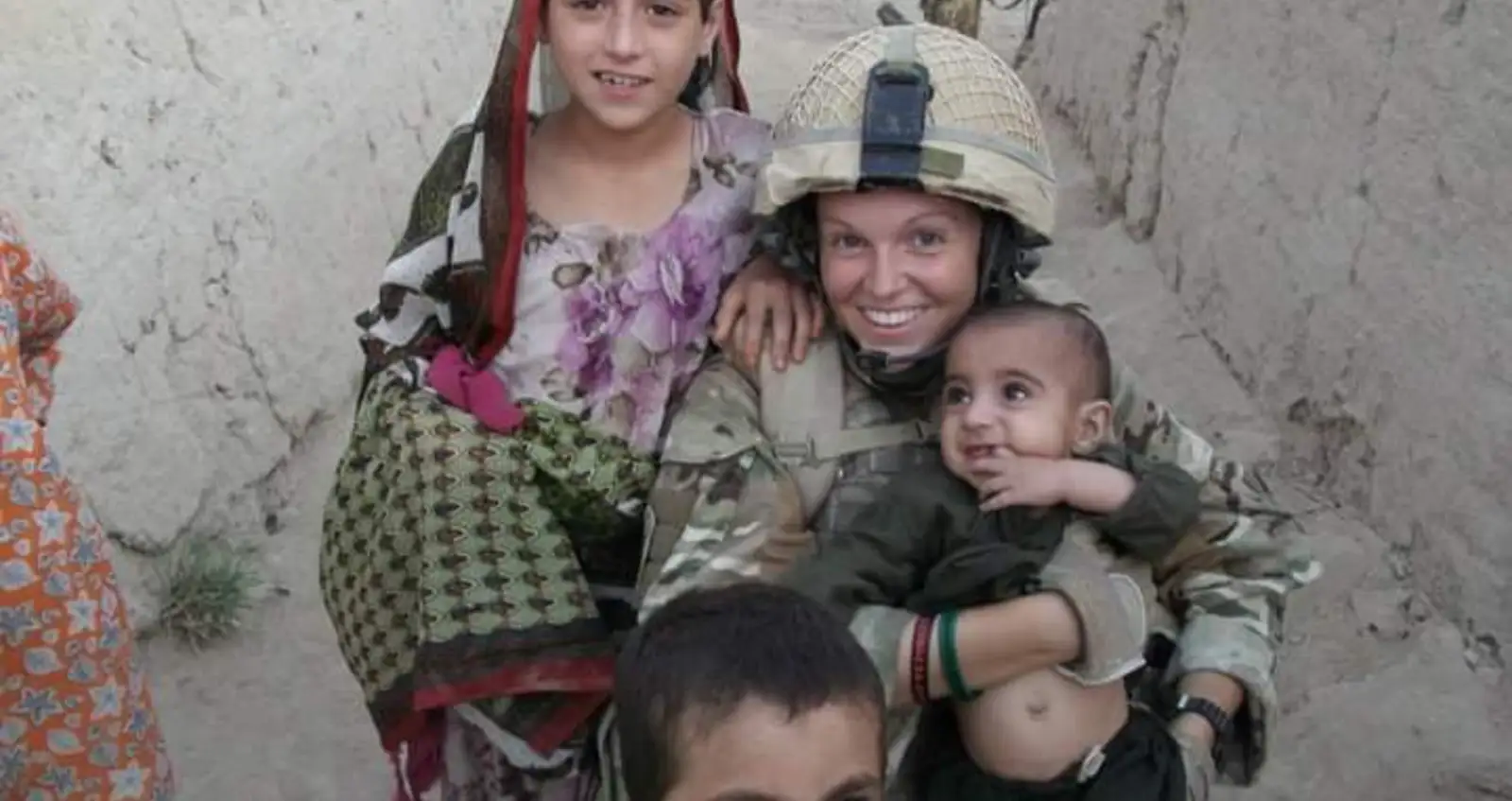 Hayley with children in Afghanistan 