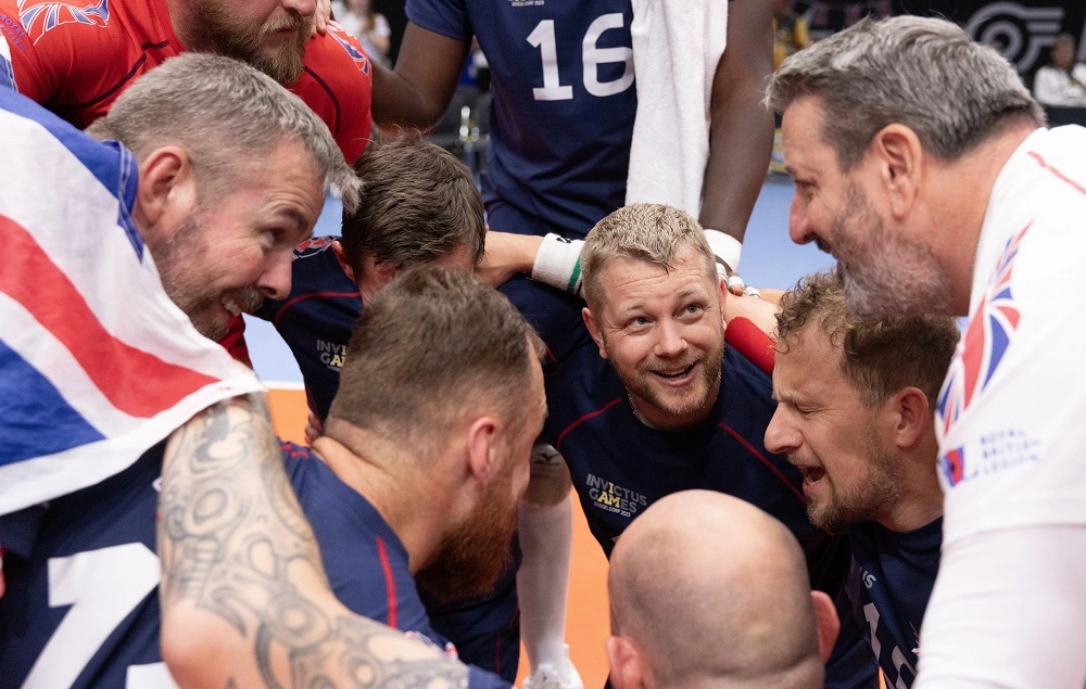 Steve Hooper in team huddle at Invictus Games