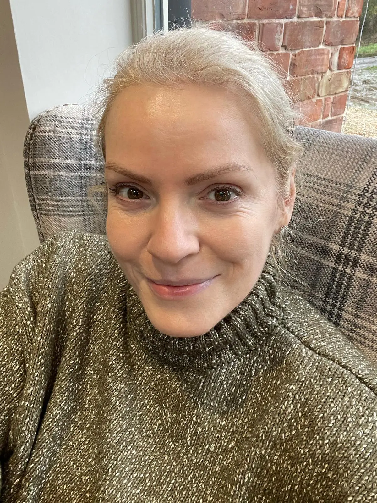 Selfie of Amanda on a train.