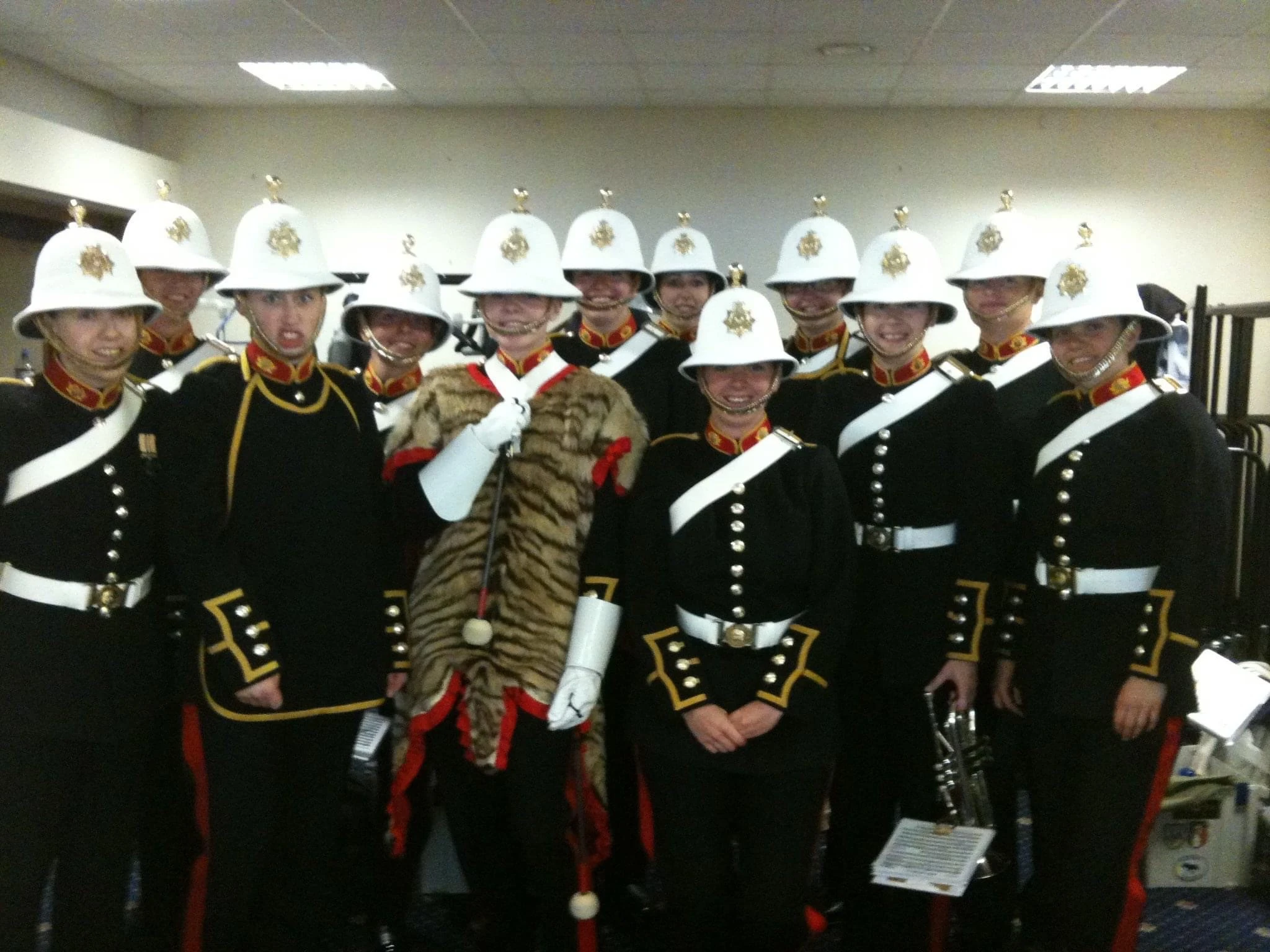 Photo of Becky alongside others from the Royal Marines Band service.