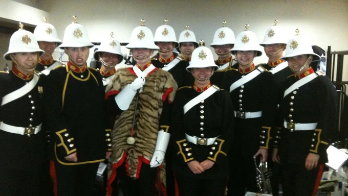 Photo of Becky alongside others from the Royal Marines Band service.