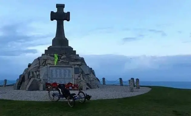 Jake's trike at a coastal war memorial