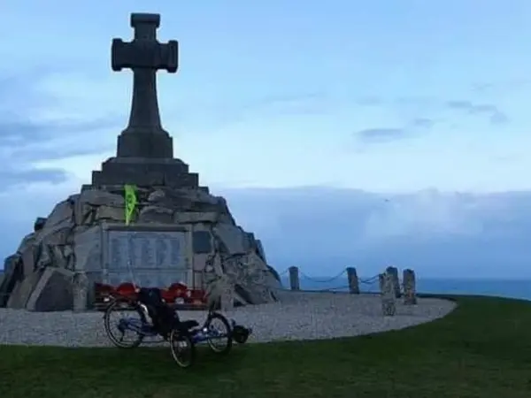 Jake's trike at a coastal war memorial