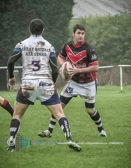 Jon playing rugby