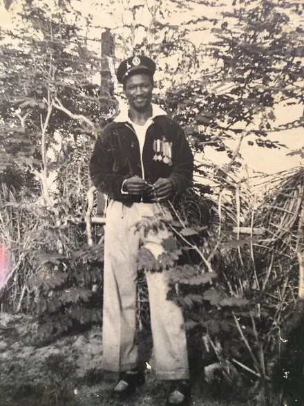 Joshua Ennin wearing medals