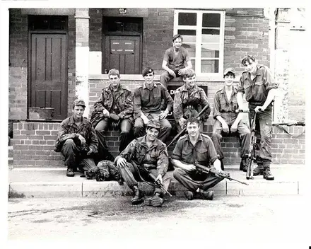 Julian and some comrades during his Army days