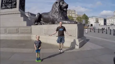 Lee and Noah on a trip out in London in Trafalgar Sqaure
