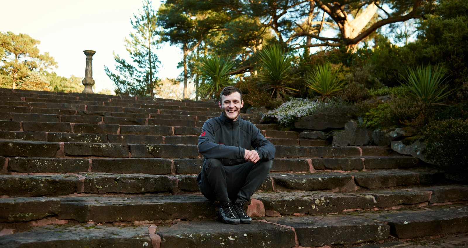Leon in the hotel grounds Leon sitting on some steps in the hotel grounds