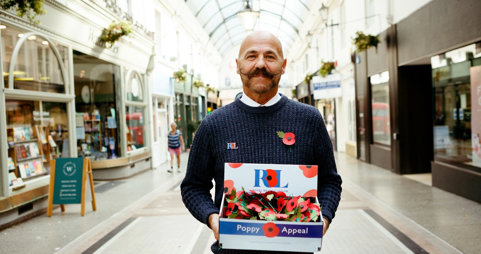 Dave Kelsey holding poppy tray